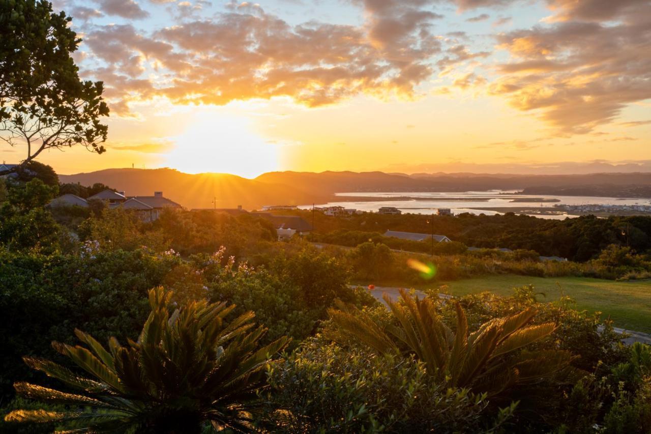 Pezula Nature Retreat Knysna Exterior photo Sunset over Lake Waikare