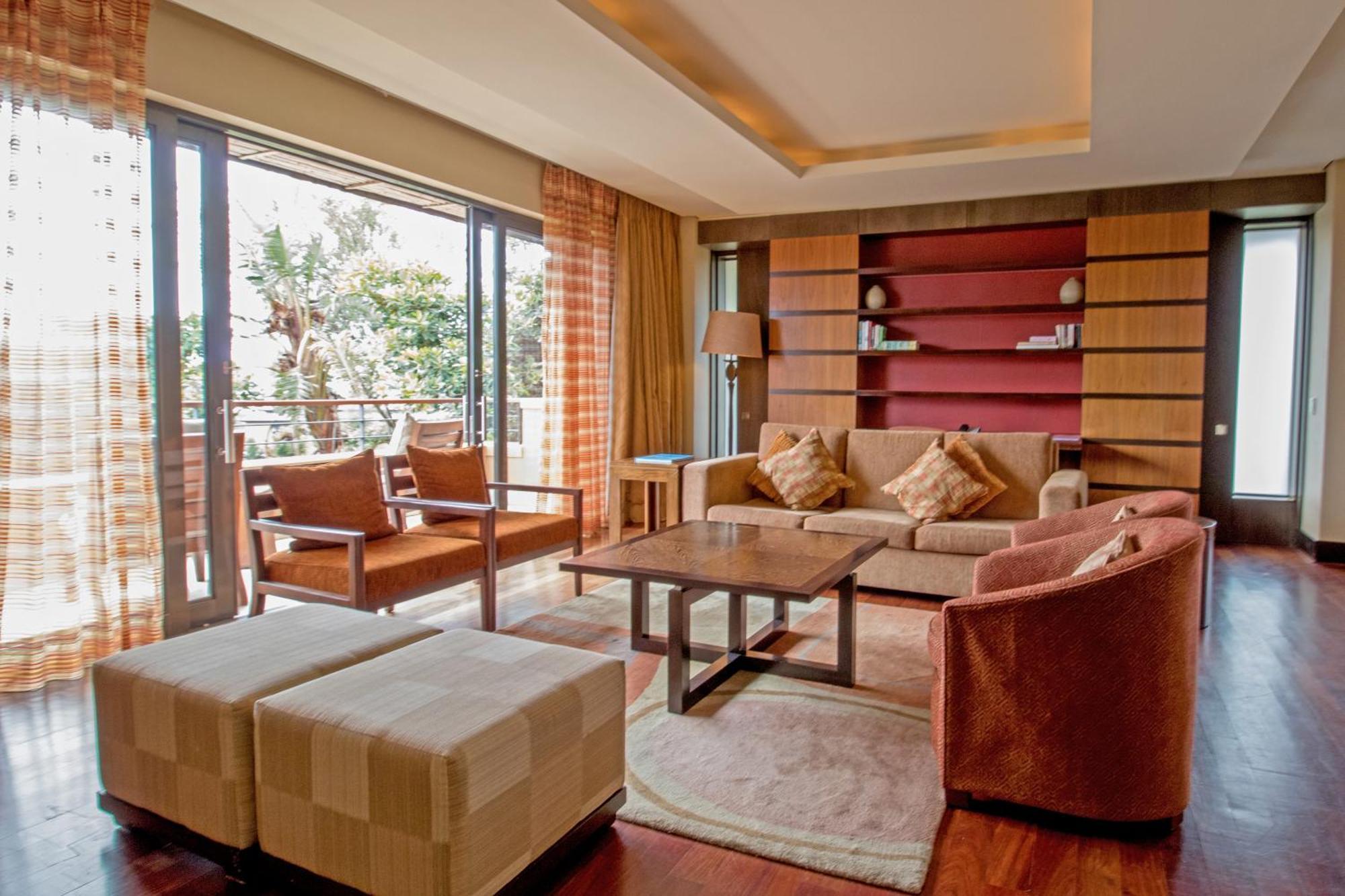 Pezula Nature Retreat Knysna Room photo A living room in a suite at the Four Seasons Hotel, Mumbai